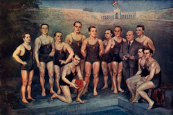 Az 1932-ben olimpiai bajnok magyar vízilabdacsapat. Öltönyben az időnként kopasz Napóleonként is nevezett kapitány, Komjádi Béla.